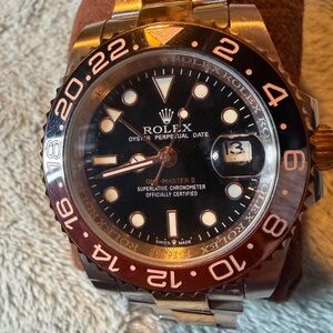Rolex GMT-Master II Black Dial with Brown and Black Bezel